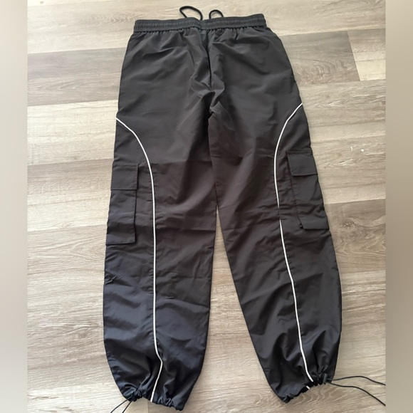 Black and White Track Pants with Modern Athletic Design - Picture 3 of 3